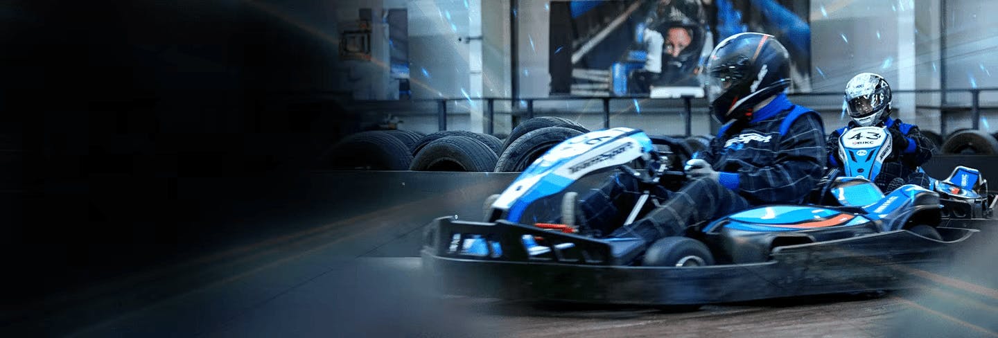 banner with karters in electric karts